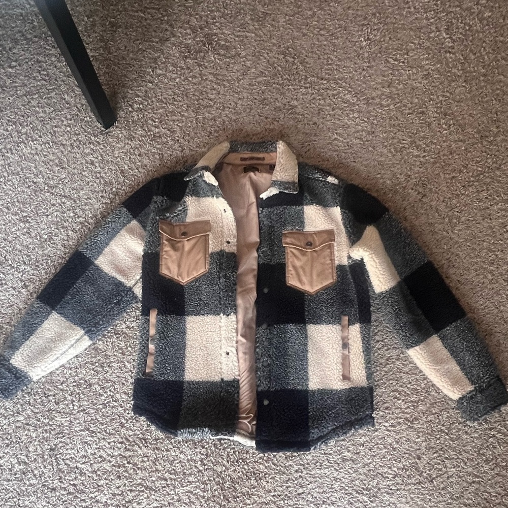 Slightly oversized, tan and black Sherpa work jacket from Todd Snyder